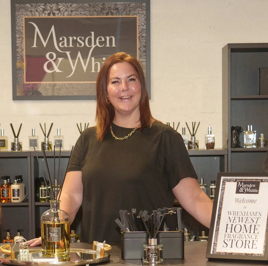 Danielle standing proudly in the Marsden & Whittle home fragrance store in Chapter Court, Wrexham
