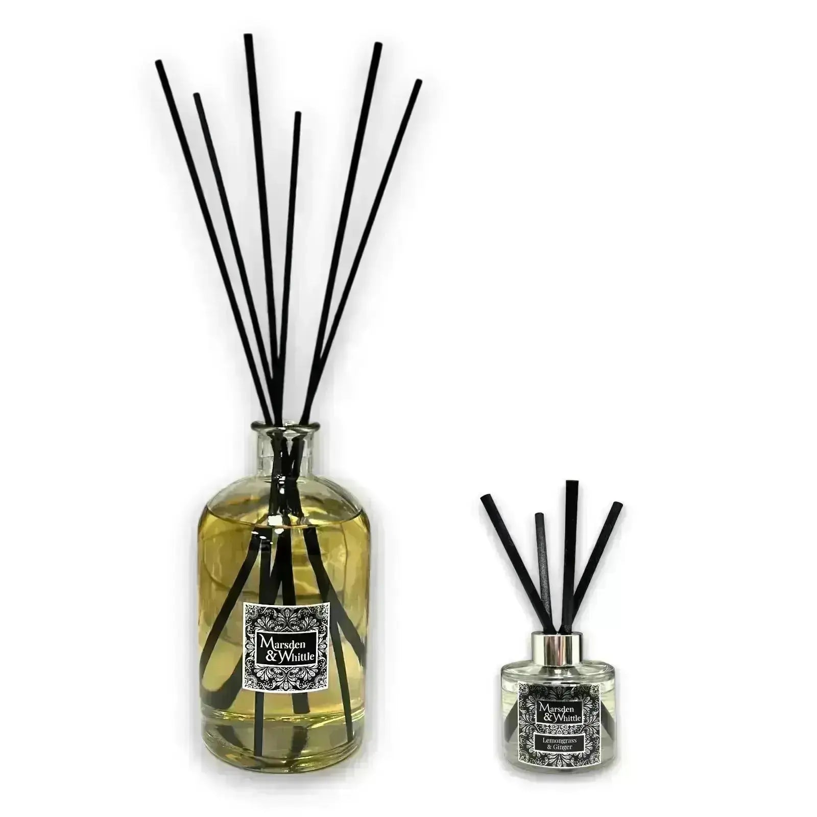 A 1000ml Statement Diffuser beside a 100ml Reed Diffuser, showing the comparison in size.