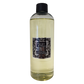 A 500ml Marsden & Whittle Reed Diffuser Refill bottle containing Damson Plum, Rose & Patchouli fragrance oil with a black screw cap top.