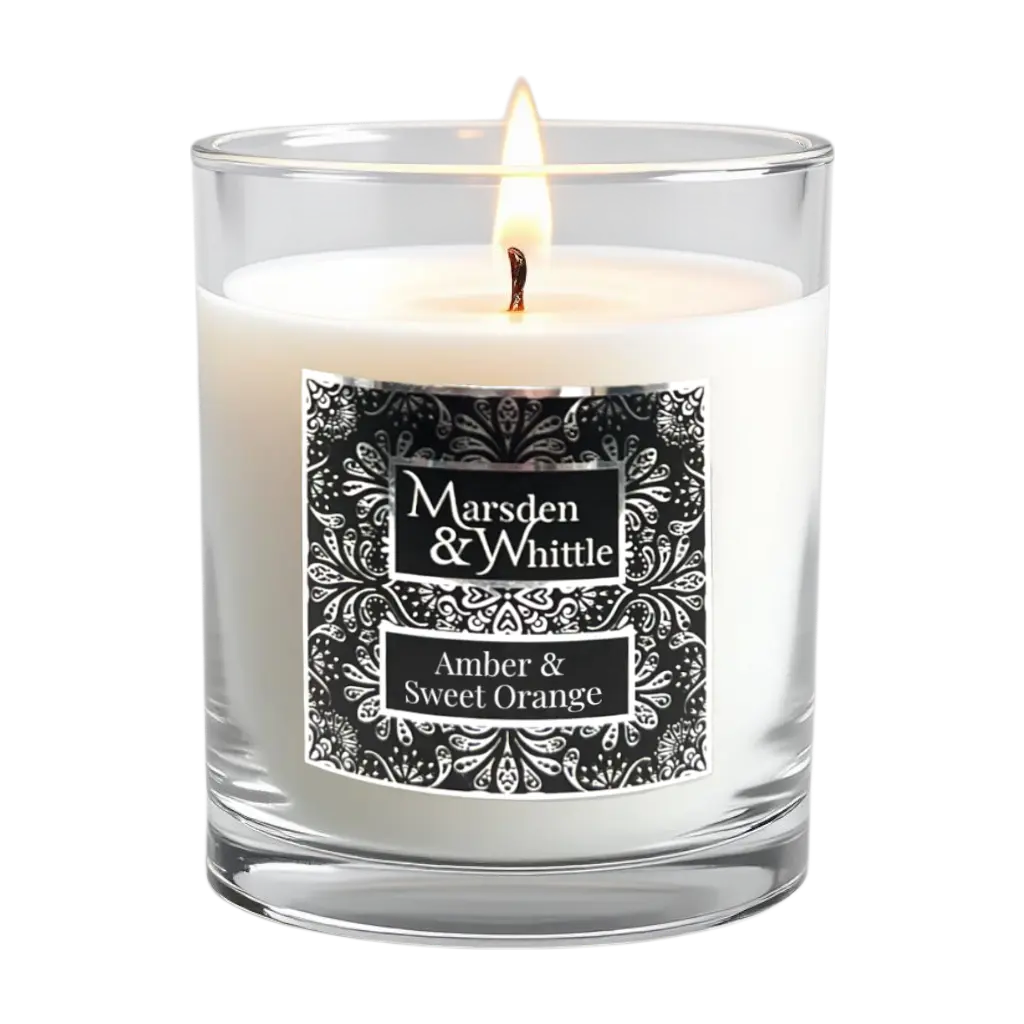 Amber & Sweet Orange Candle in a clear glass jar