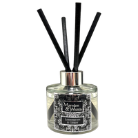Marsden & Whittle Lemongrass & Ginger reed diffuser with a clear glass bottle, black liquid, black reeds, and a black-and-white patterned label on a white background.