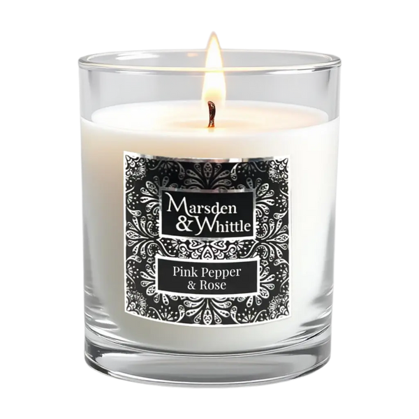 Pink Pepper & Rose Candle in a clear glass jar