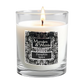 A lit white candle in a clear glass jar with a black and chrome ornate label reading 'Marsden & Whittle' and 'Pumpkin Spice'.