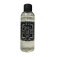 A clear plastic bottle of Marsden & Whittle Pumpkin Spice fragrance oil with a black cap and a black label featuring white text and leaf patterns.